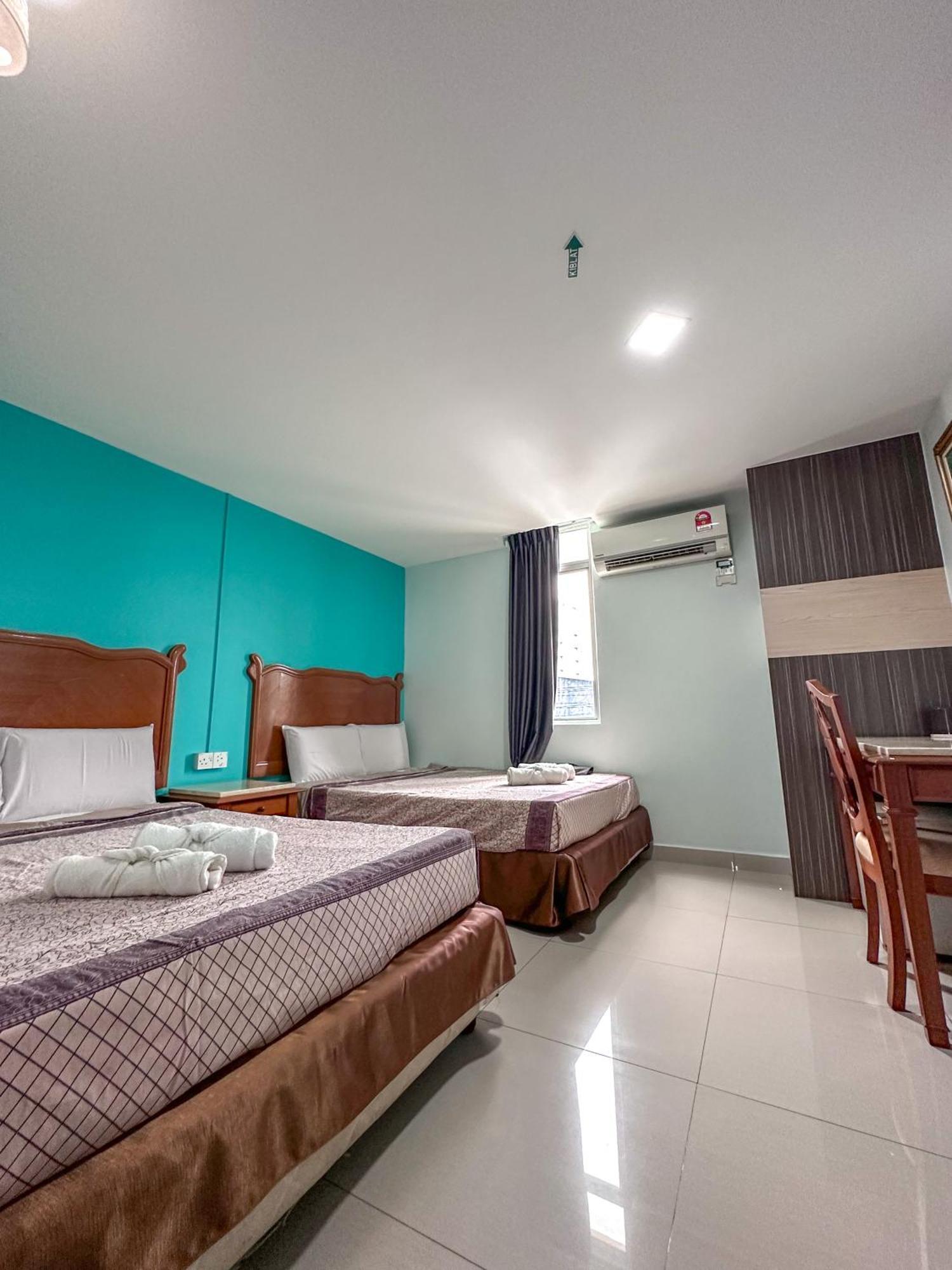 G Star Hotel Pantai Remis Buitenkant foto