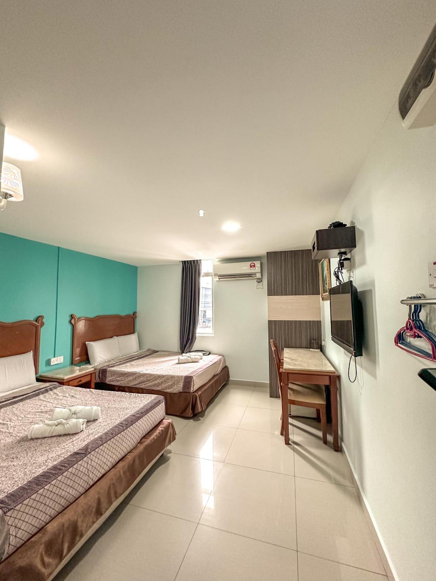 G Star Hotel Pantai Remis Buitenkant foto